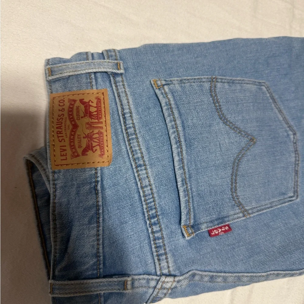 Levi's 711 Light‎ Blue Distressed Skinny Jeans